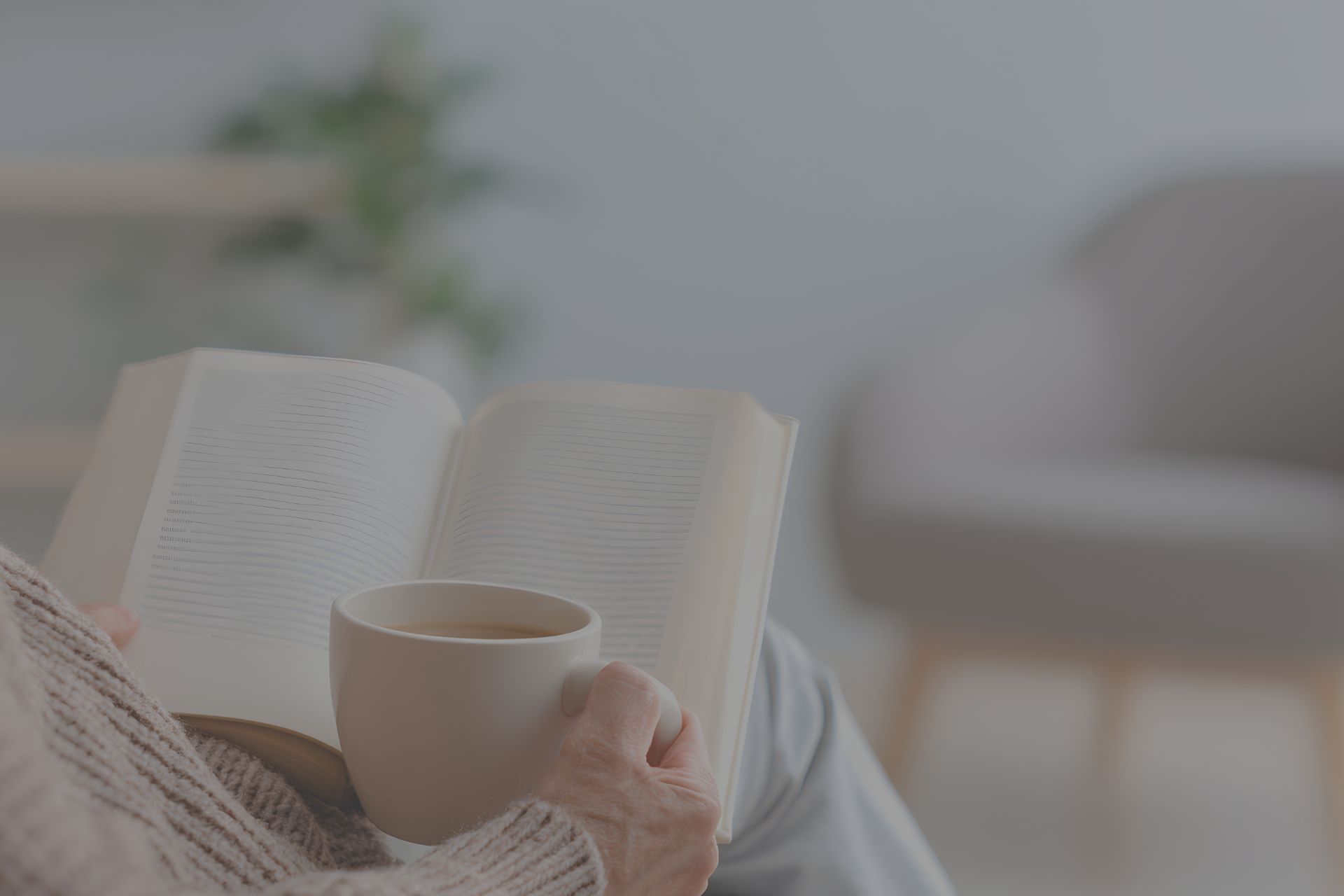 Simple self-care break for caregivers—enjoying tea and reading for relaxation